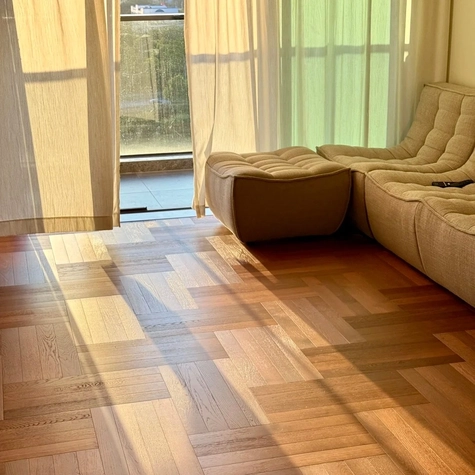 When the natural grain of the wooden floor meets the sunlight, it becomes absolutely stunning!
